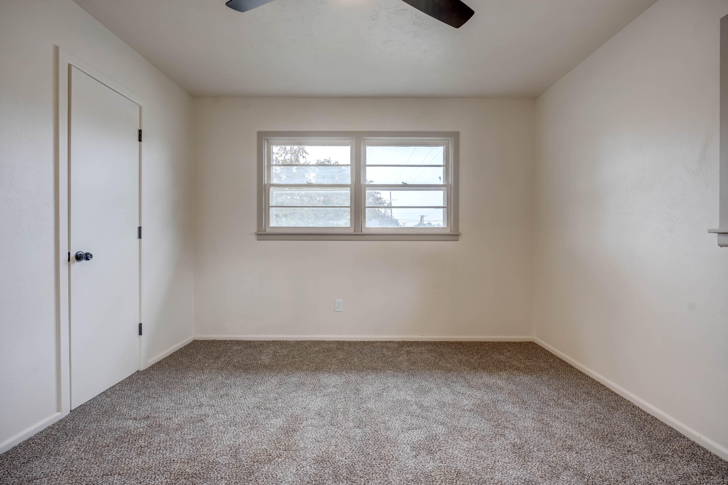 2101 64th Street Lubbock, TX 79412 - Photo 23 of 30 an empty room with a window