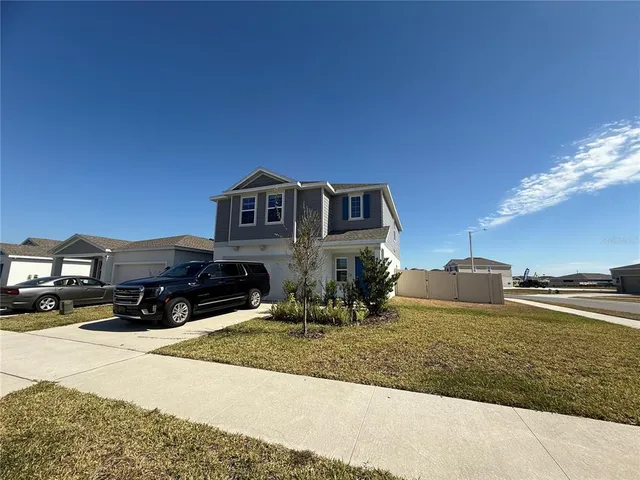 a view of a house with a patio