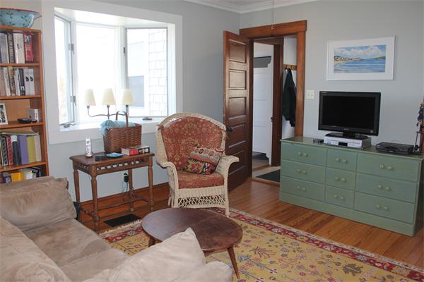 8 Salt Island Road Gloucester, MA 01930 - Photo 13 of 20 a living room with furniture and a flat screen tv