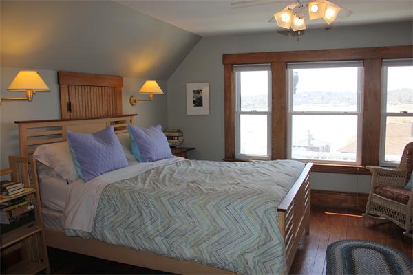 8 Salt Island Road Gloucester, MA 01930 - Photo 16 of 20 a bedroom with a bed and window