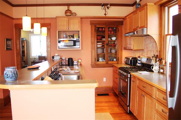 8 Salt Island Road Gloucester, MA 01930 - Photo 7 of 20 a kitchen with stainless steel appliances granite countertop a sink stove and cabinets