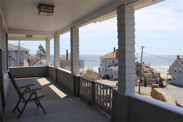 8 Salt Island Road Gloucester, MA 01930 - Photo 8 of 20 a view of a balcony with a couch