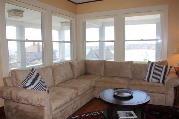8 Salt Island Road Gloucester, MA 01930 - Photo 9 of 20 a living room with furniture and a large window