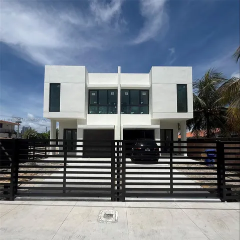 a view of a building with wooden floor and windows