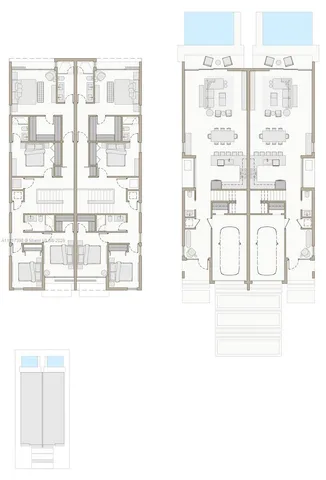 an aerial view of residential houses with city view