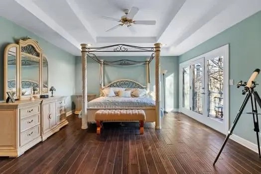 a bathroom with a sink a mirror and a shower