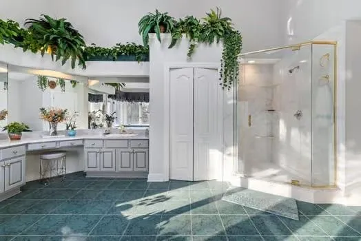 a spacious bedroom with a bed and a window