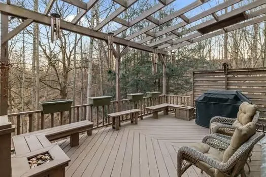 a view of a house with a tree