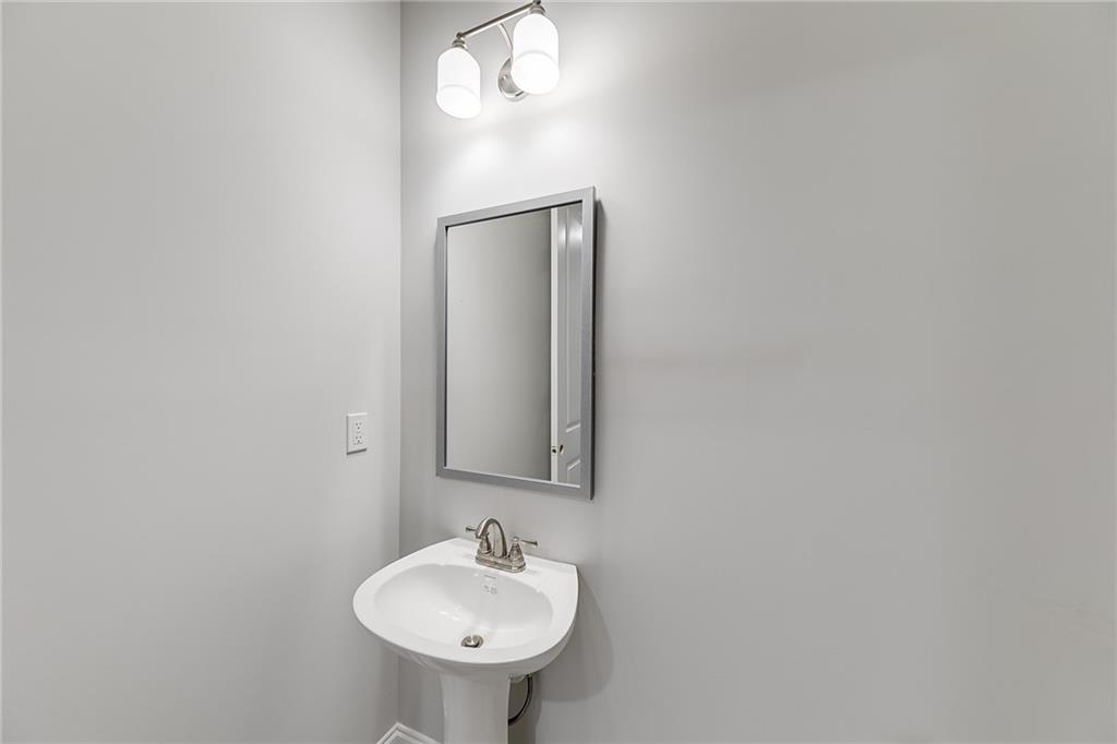 114 Classic Overlook Homer, GA 30547 - Photo 24 of 39 a bathroom with a sink and a mirror