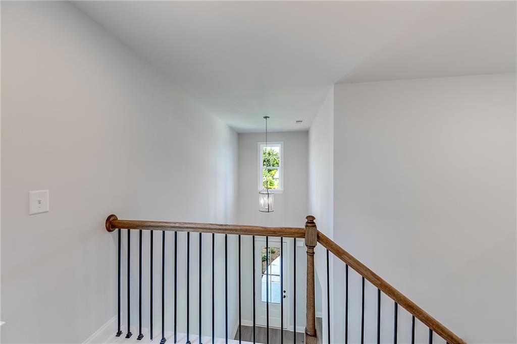 114 Classic Overlook Homer, GA 30547 - Photo 26 of 39 a view of a hallway with wooden floor and a window