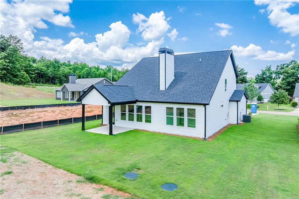 114 Classic Overlook Homer, GA 30547 - Photo 36 of 39 a front view of a house with garden