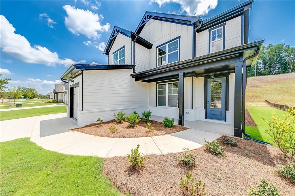 114 Classic Overlook Homer, GA 30547 - Photo 5 of 39 a front view of a house with garden