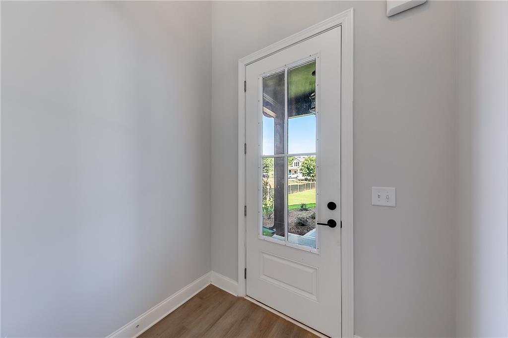 114 Classic Overlook Homer, GA 30547 - Photo 7 of 39 a view of an entryway with wooden floor