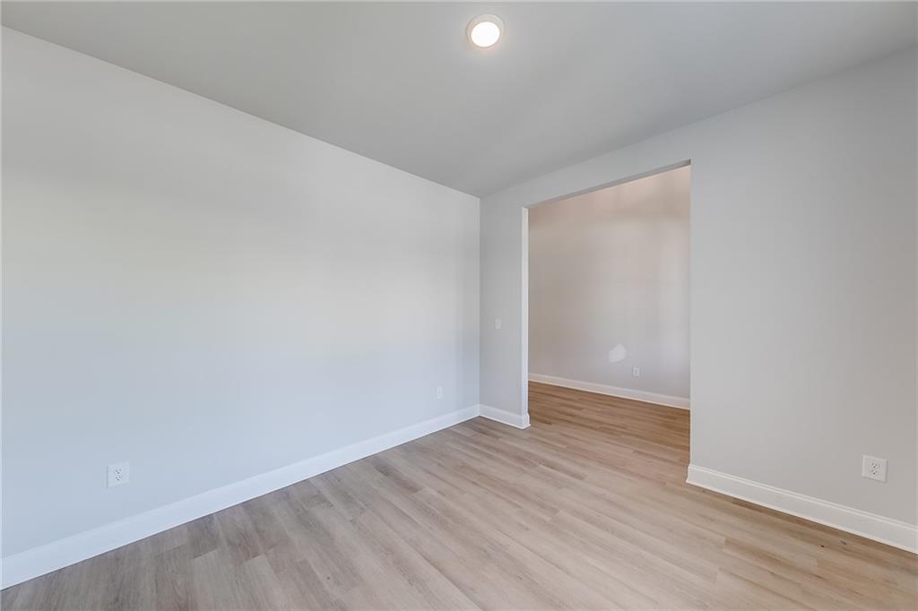 114 Classic Overlook Homer, GA 30547 - Photo 10 of 39 a view of an empty room with wooden floor