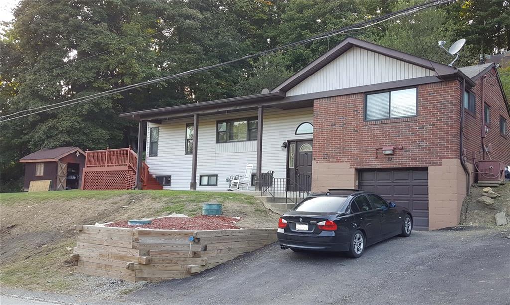 19 Patterson Road Finleyville, PA 15332 - Photo 20 of 20 One car garage with auto opener. Extra parking spots.