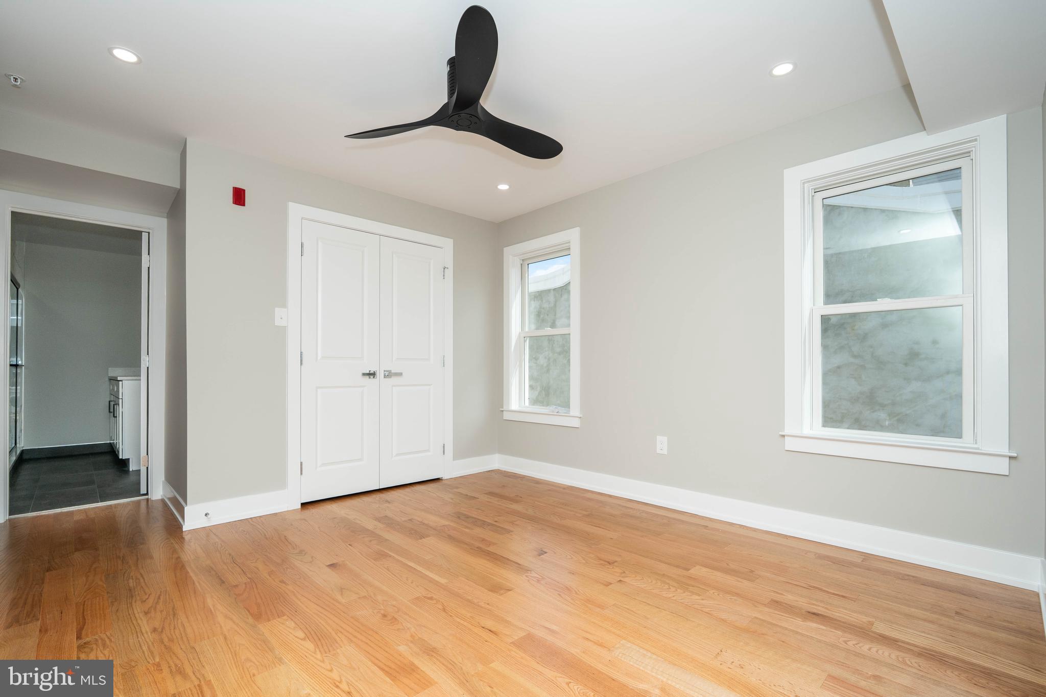 1711 South 5th Street, Unit 3 Philadelphia, PA 19148 - Photo 7 of 9 a view of an empty room with a window