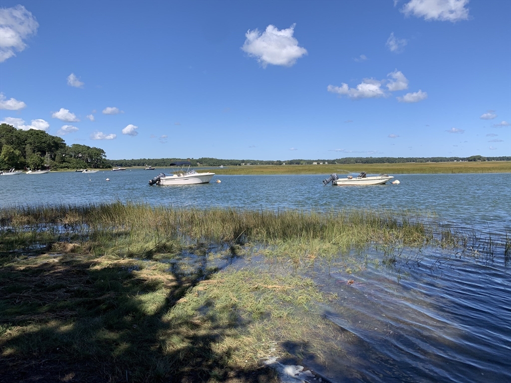 45 Old Cove Road Duxbury, MA 02332 - Photo 2 of 12 a view of an ocean and beach