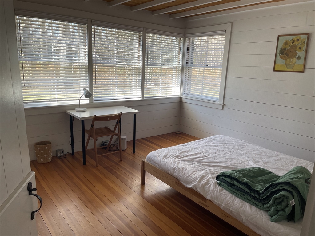 45 Old Cove Road Duxbury, MA 02332 - Photo 8 of 12 a bedroom with a bed and a window