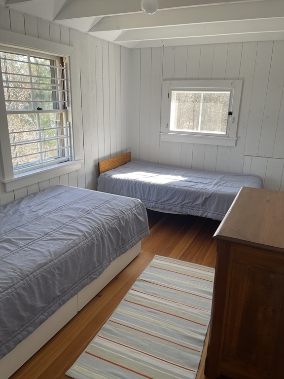 45 Old Cove Road Duxbury, MA 02332 - Photo 9 of 12 a bedroom with bed and window