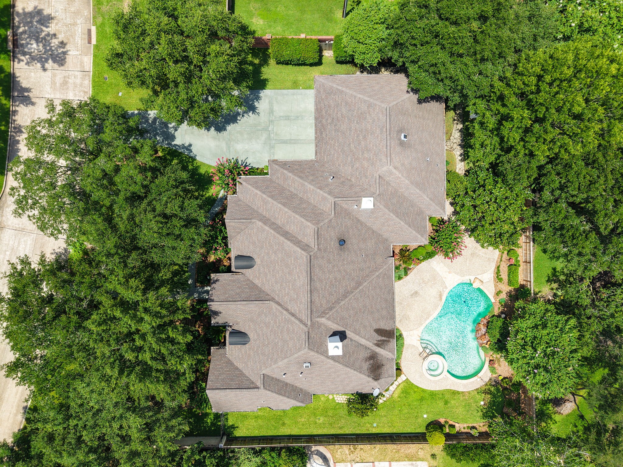 6610 Radley Drive Spring, TX 77379 - Photo 42 of 50 1/2 ACRE LOT. 50-year guaranteed roof. Double driveway. Healthy full trees & shrubs.