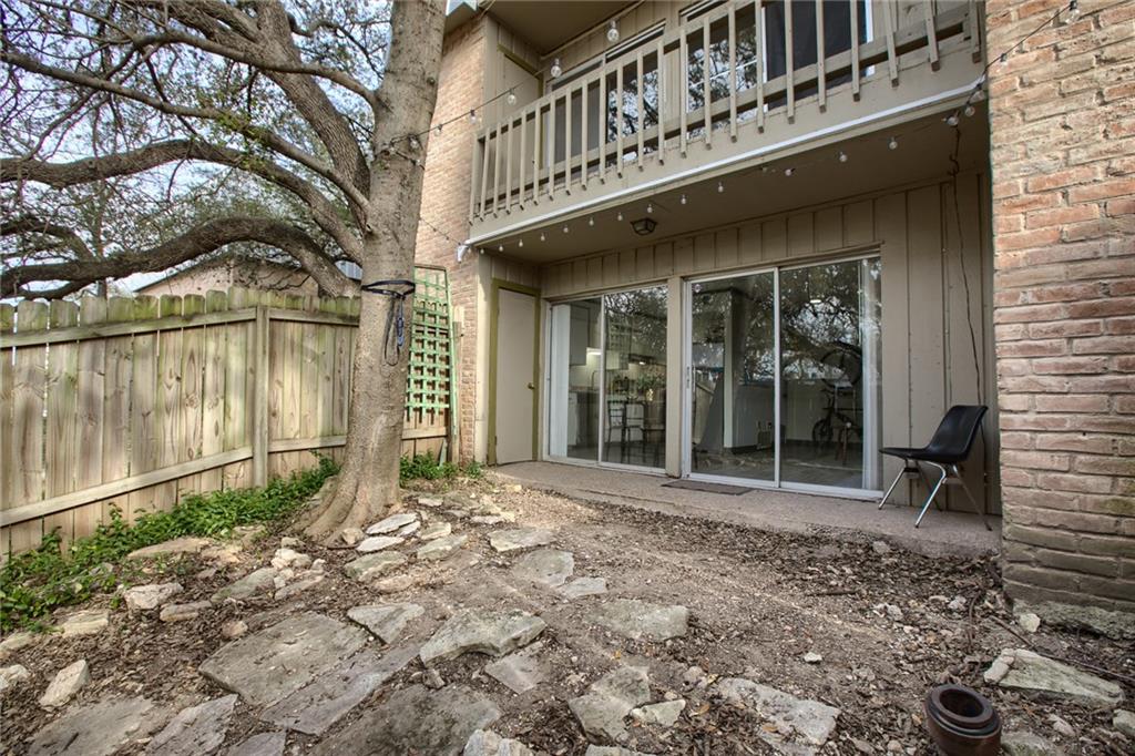 620 South 1st Street, Unit 107 Austin, TX 78704 - Photo 16 of 22 a front view of a house with a porch