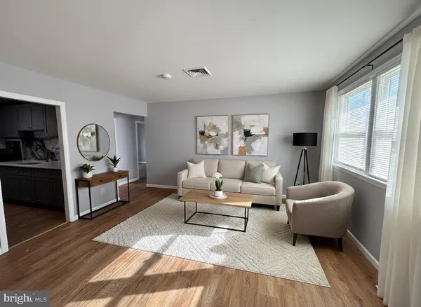 a living room with furniture and a couch