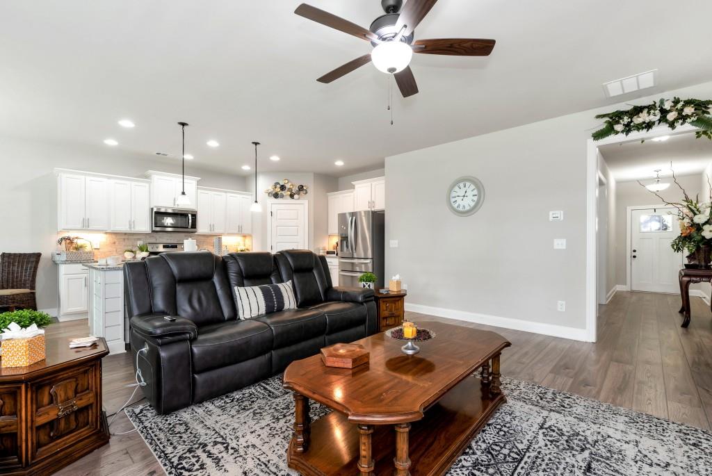1311 Calgary Lake Drive Winder, GA 30680 - Photo 12 of 45 a living room with furniture and kitchen view