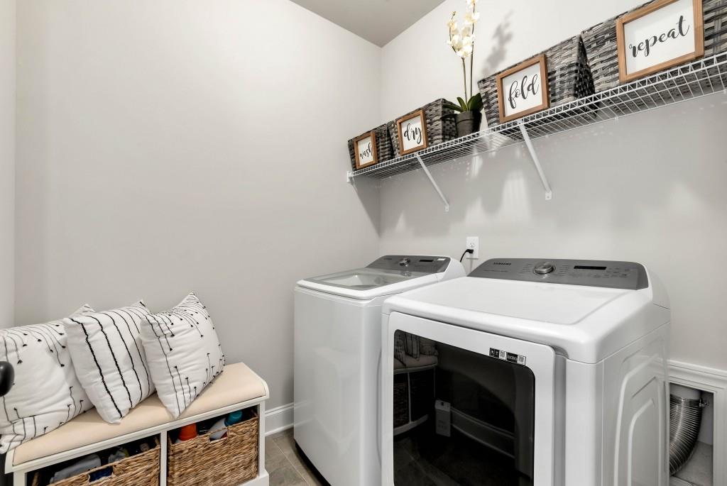 1311 Calgary Lake Drive Winder, GA 30680 - Photo 28 of 45 a utility room with dryer and washer