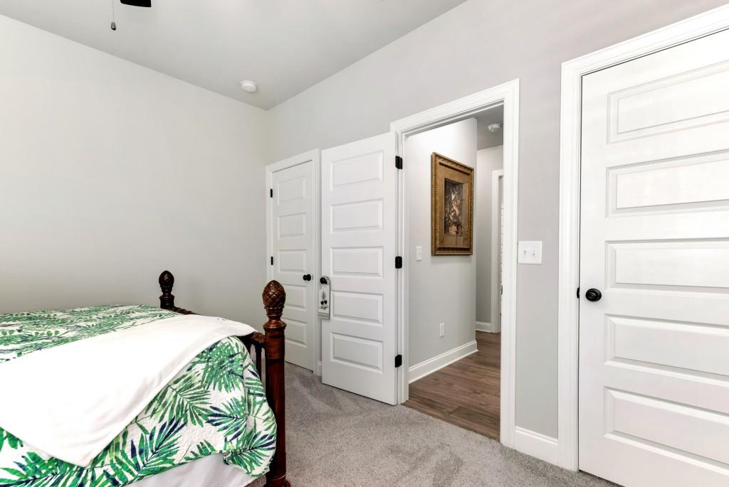 1311 Calgary Lake Drive Winder, GA 30680 - Photo 33 of 45 a bedroom with a bed and a window