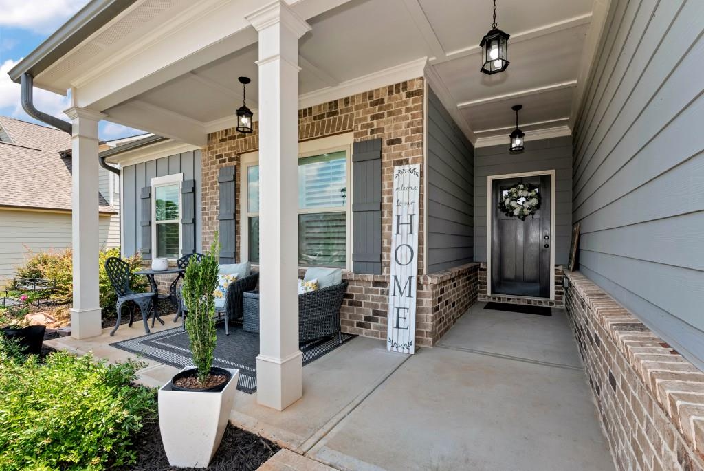 1311 Calgary Lake Drive Winder, GA 30680 - Photo 4 of 45 a porch with seating space