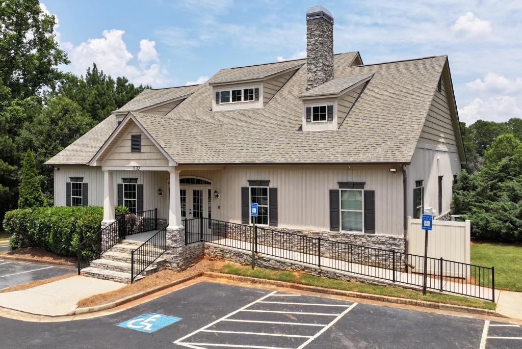 1311 Calgary Lake Drive Winder, GA 30680 - Photo 41 of 45 a front view of a house with a yard