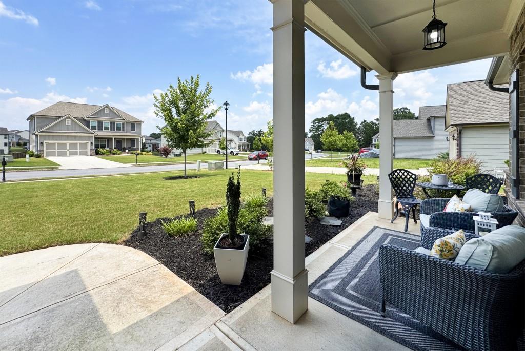 1311 Calgary Lake Drive Winder, GA 30680 - Photo 5 of 45 a view of an house with backyard and patio