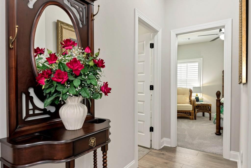 1311 Calgary Lake Drive Winder, GA 30680 - Photo 7 of 45 a flower pot with wooden floor