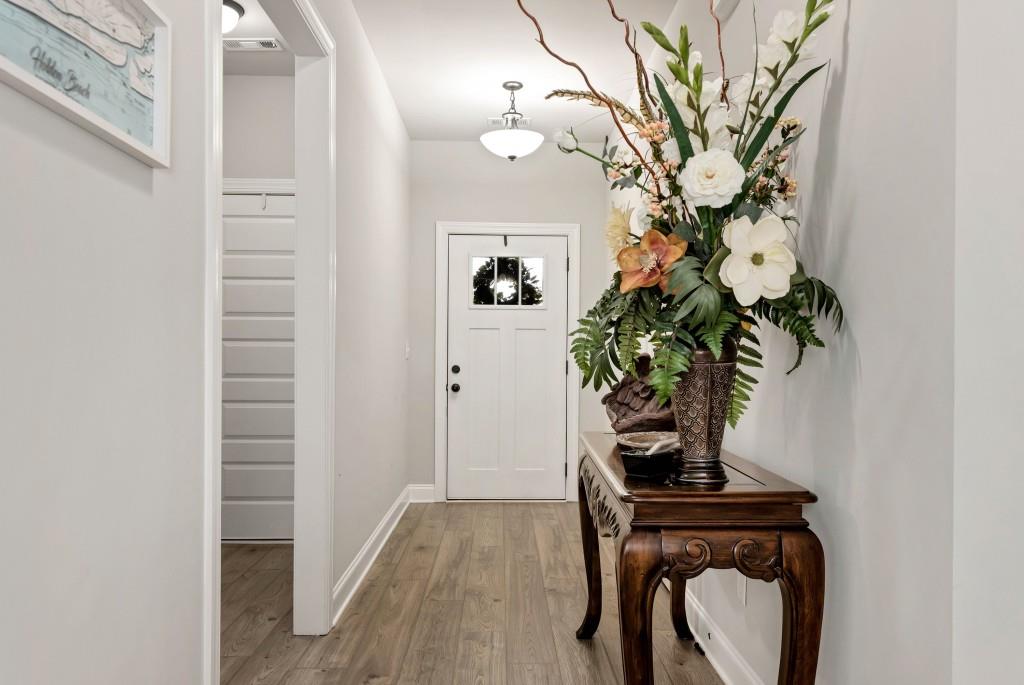 1311 Calgary Lake Drive Winder, GA 30680 - Photo 8 of 45 a vase of flowers sitting on a table