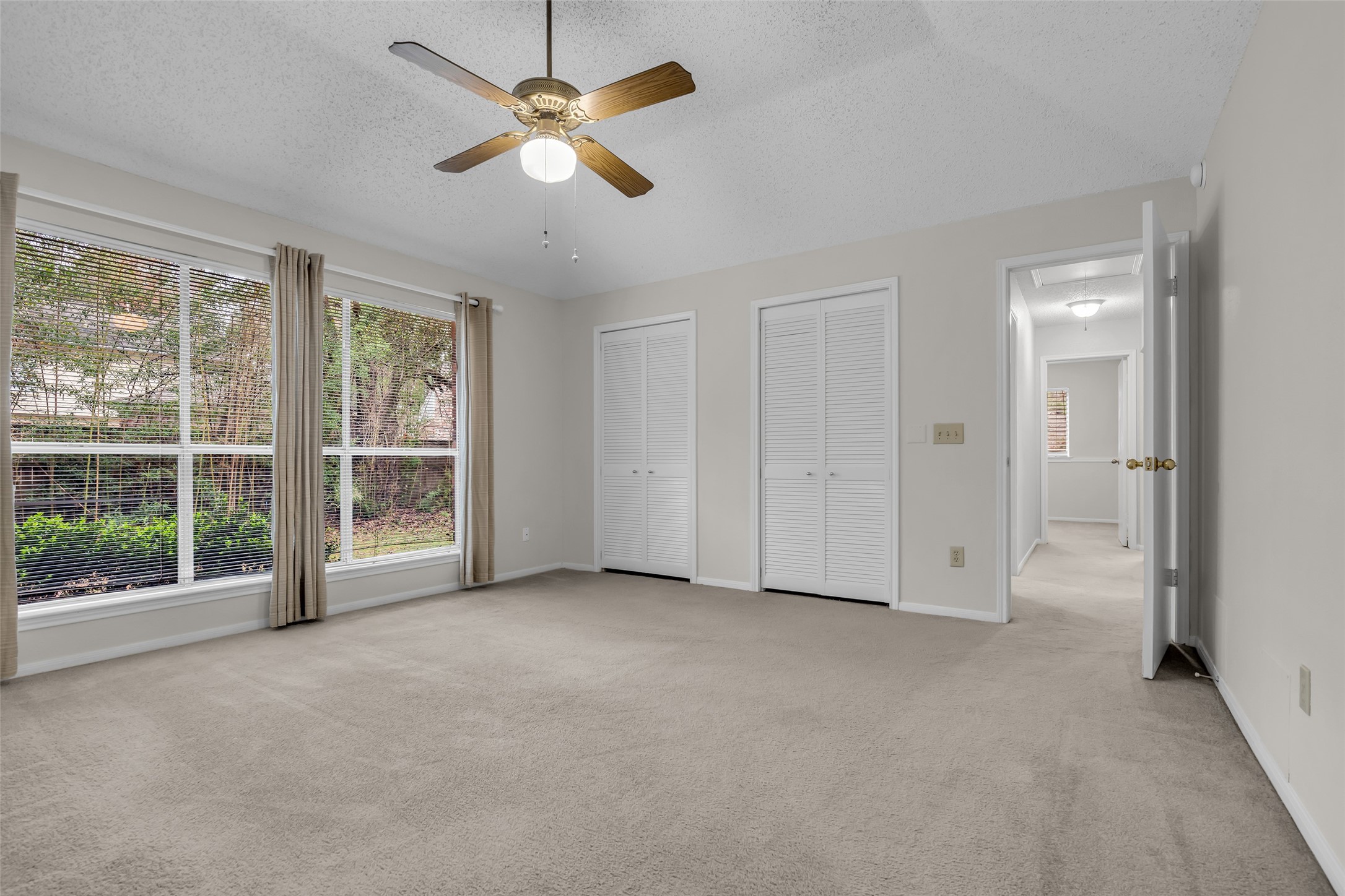 10 Treadwell Court Spring, TX 77381 - Photo 15 of 35 Wall of closets in the primary bedroom