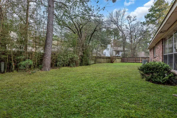 a view of a garden with a tree