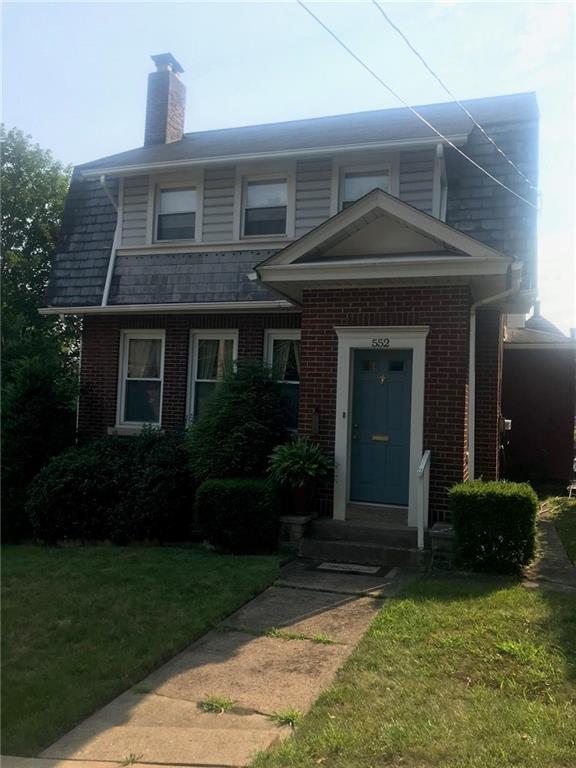 552 4th Street Butler, PA 16001 - Photo 1 of 5 a front view of a house with garden