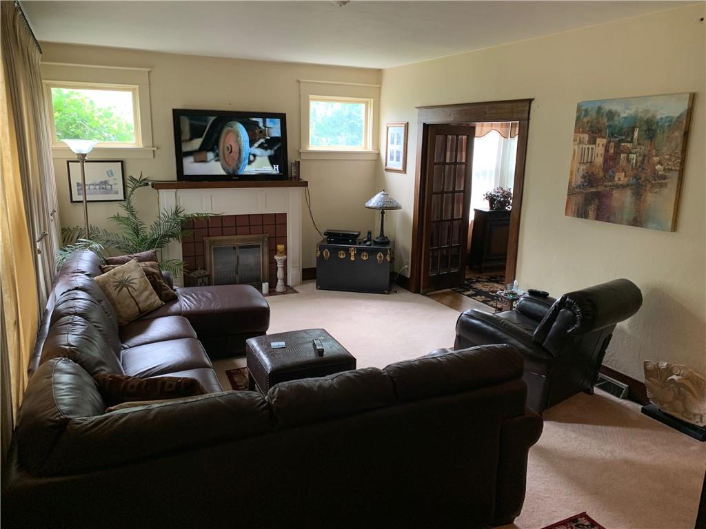 552 4th Street Butler, PA 16001 - Photo 5 of 5 a living room with furniture and a flat screen tv