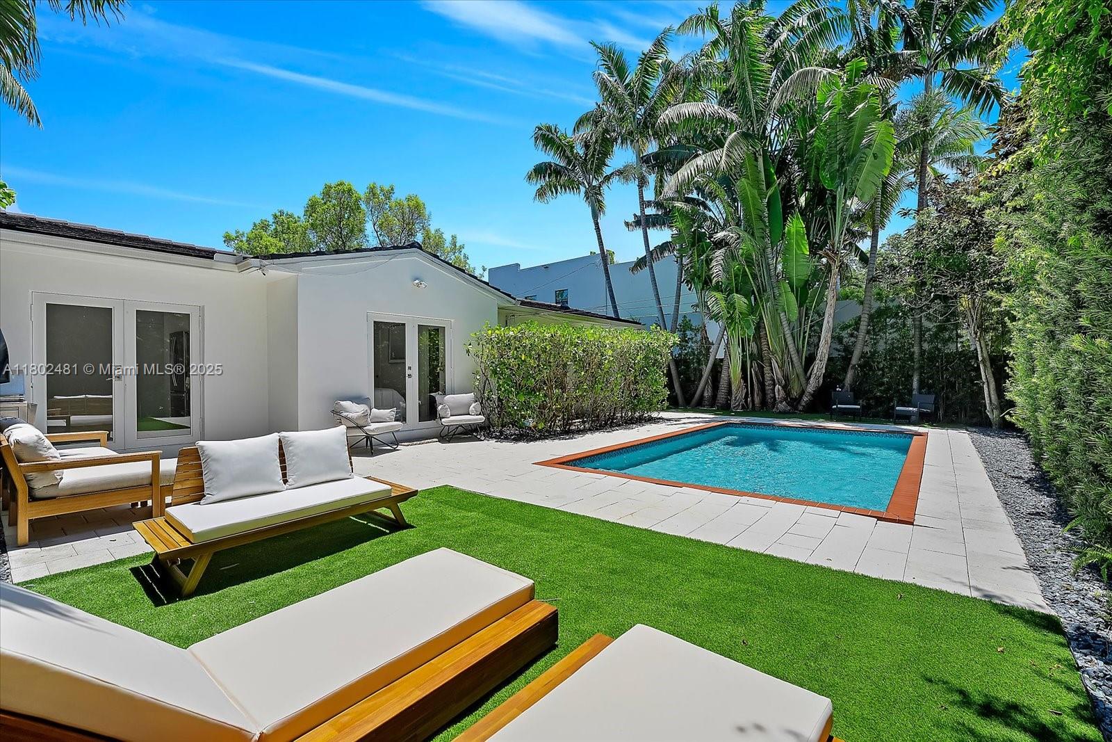 3020 Alton Road Miami Beach, FL 33140 - Photo 2 of 40 a view of yard with patio