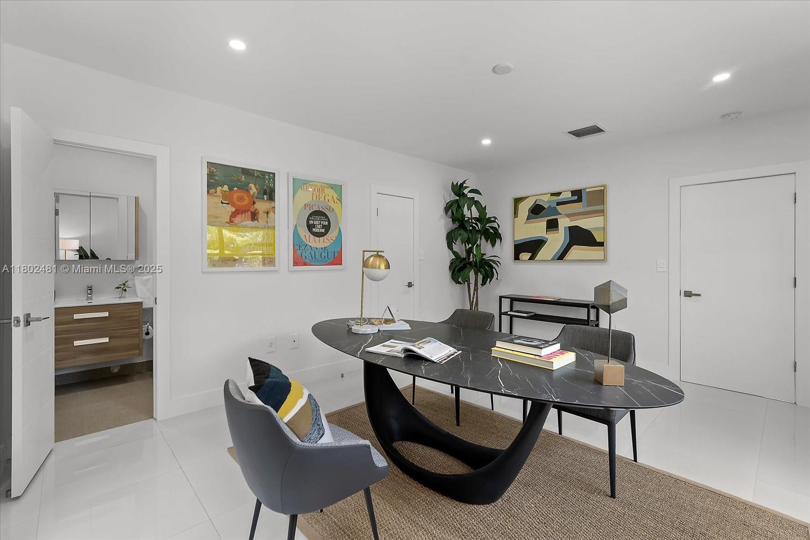 3020 Alton Road Miami Beach, FL 33140 - Photo 21 of 40 a view of a livingroom with furniture