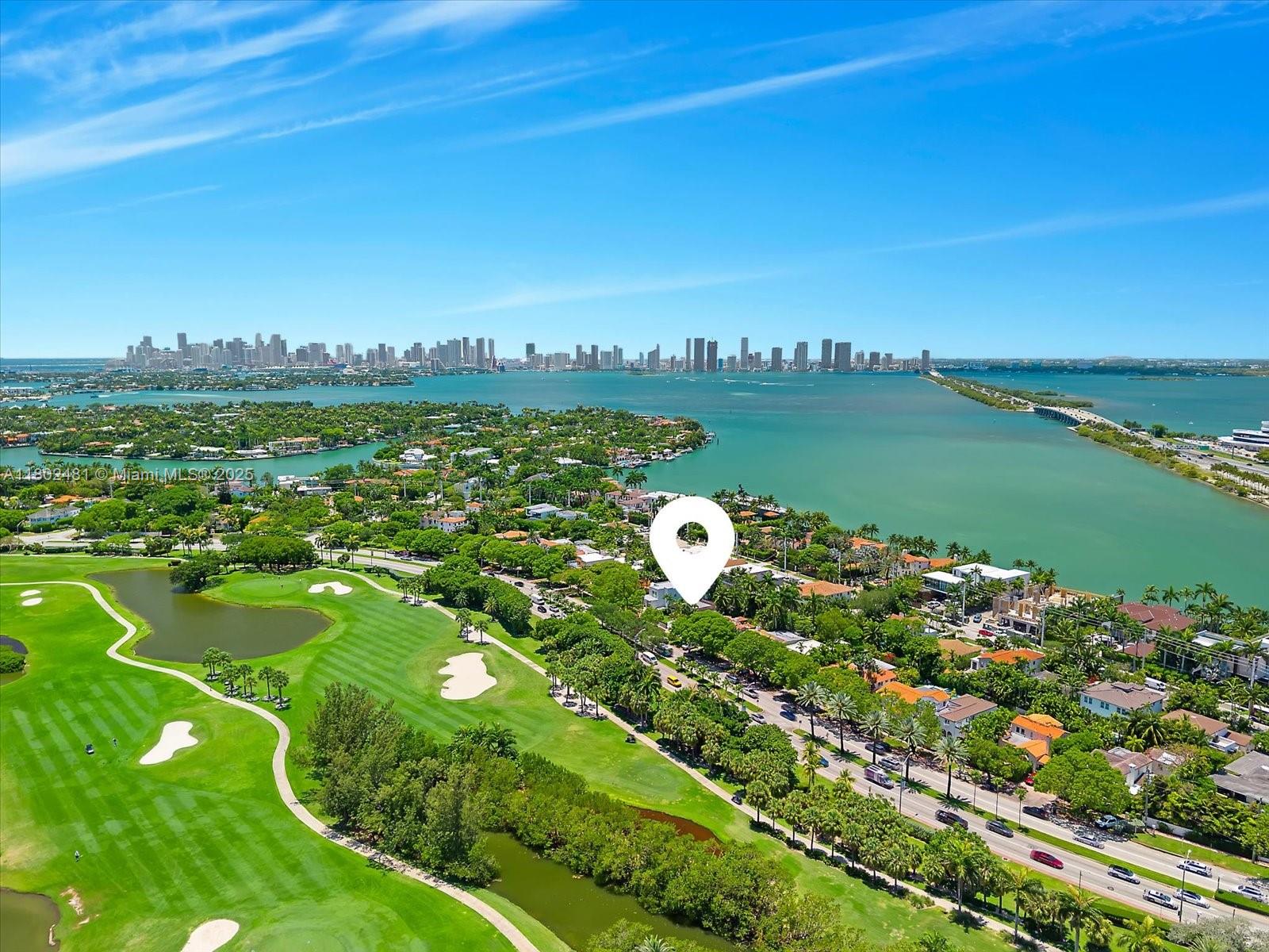 3020 Alton Road Miami Beach, FL 33140 - Photo 39 of 40 a view of a lake with a city