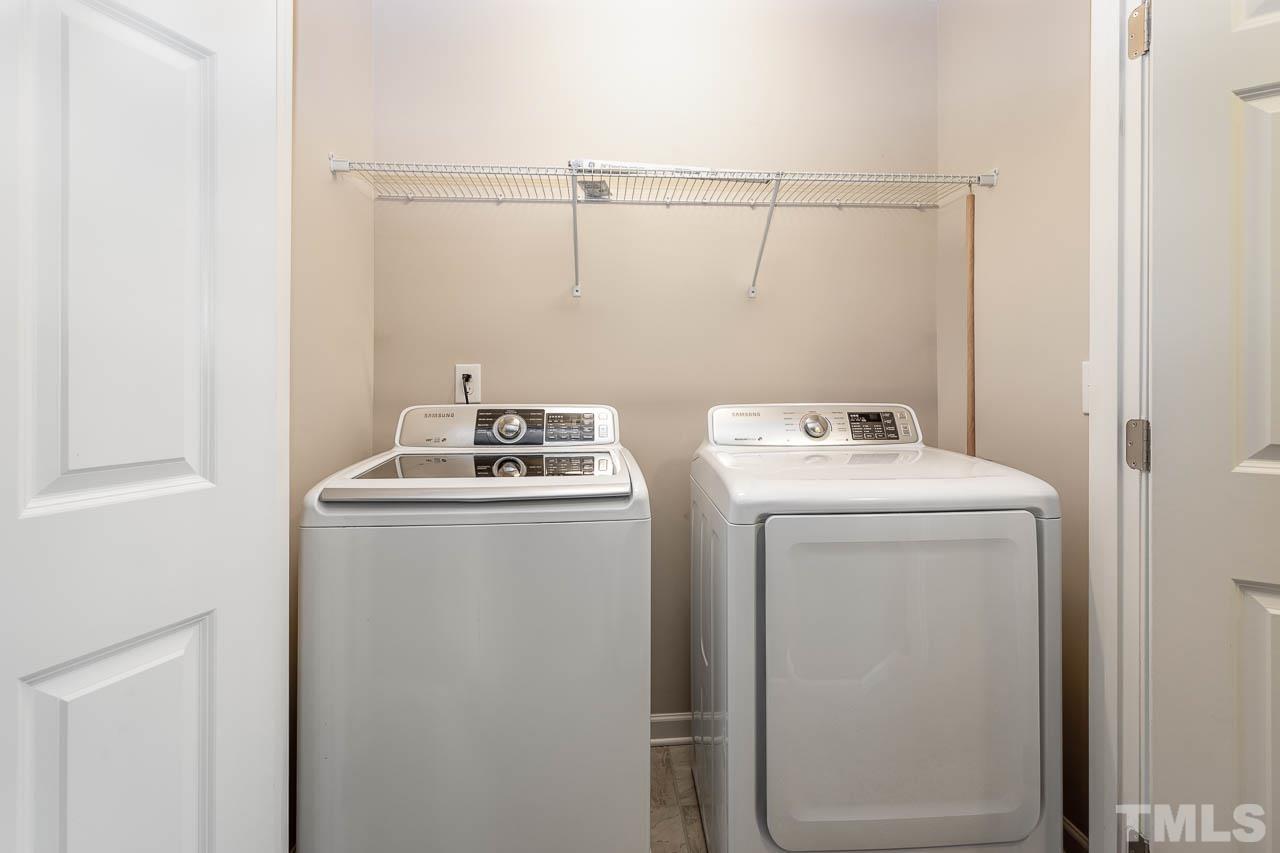 421 Provincial Street Raleigh, NC 27603 - Photo 17 of 22 a utility room with dryer and washer