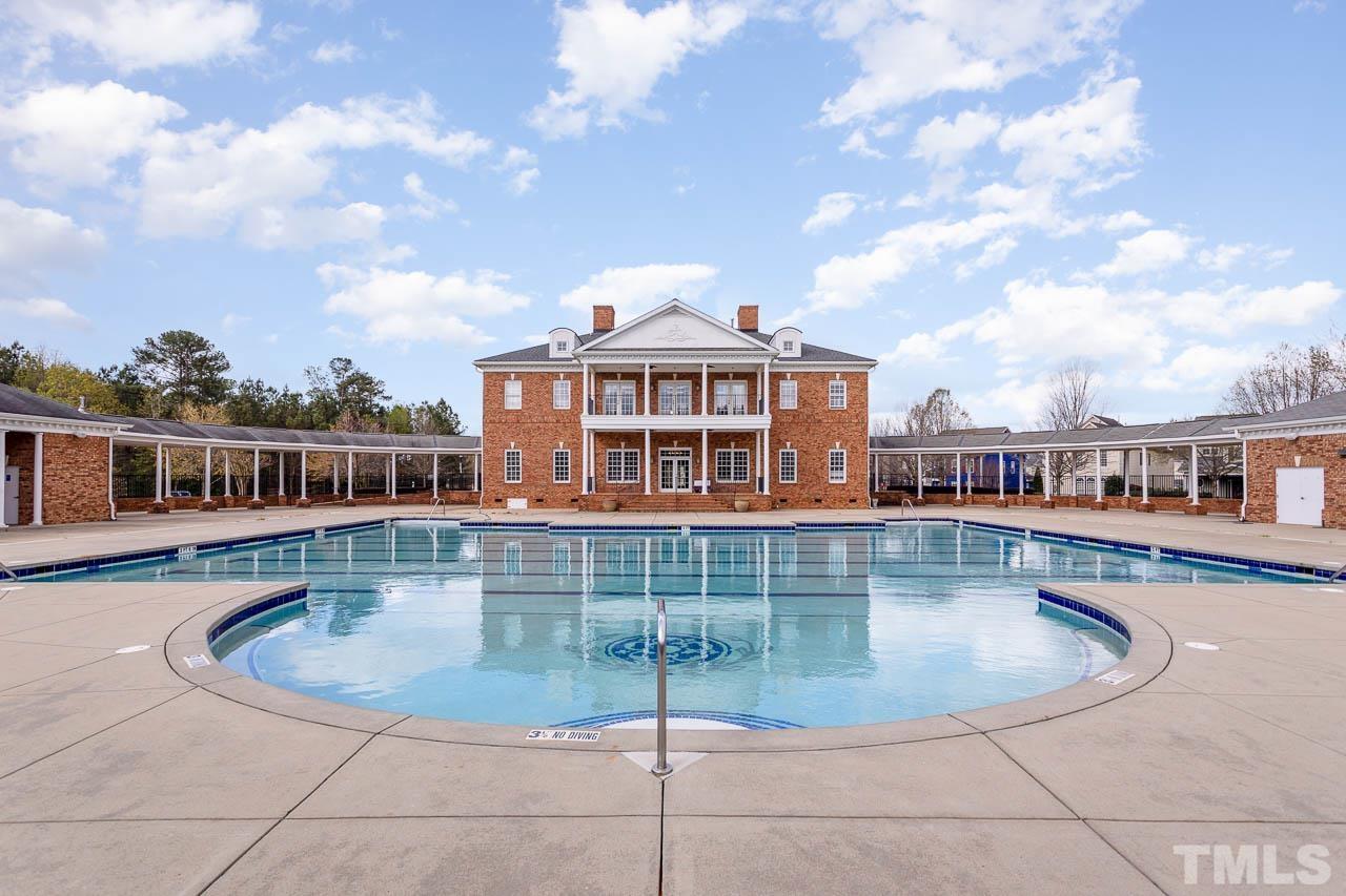 421 Provincial Street Raleigh, NC 27603 - Photo 20 of 22 a view of a swimming pool with a patio
