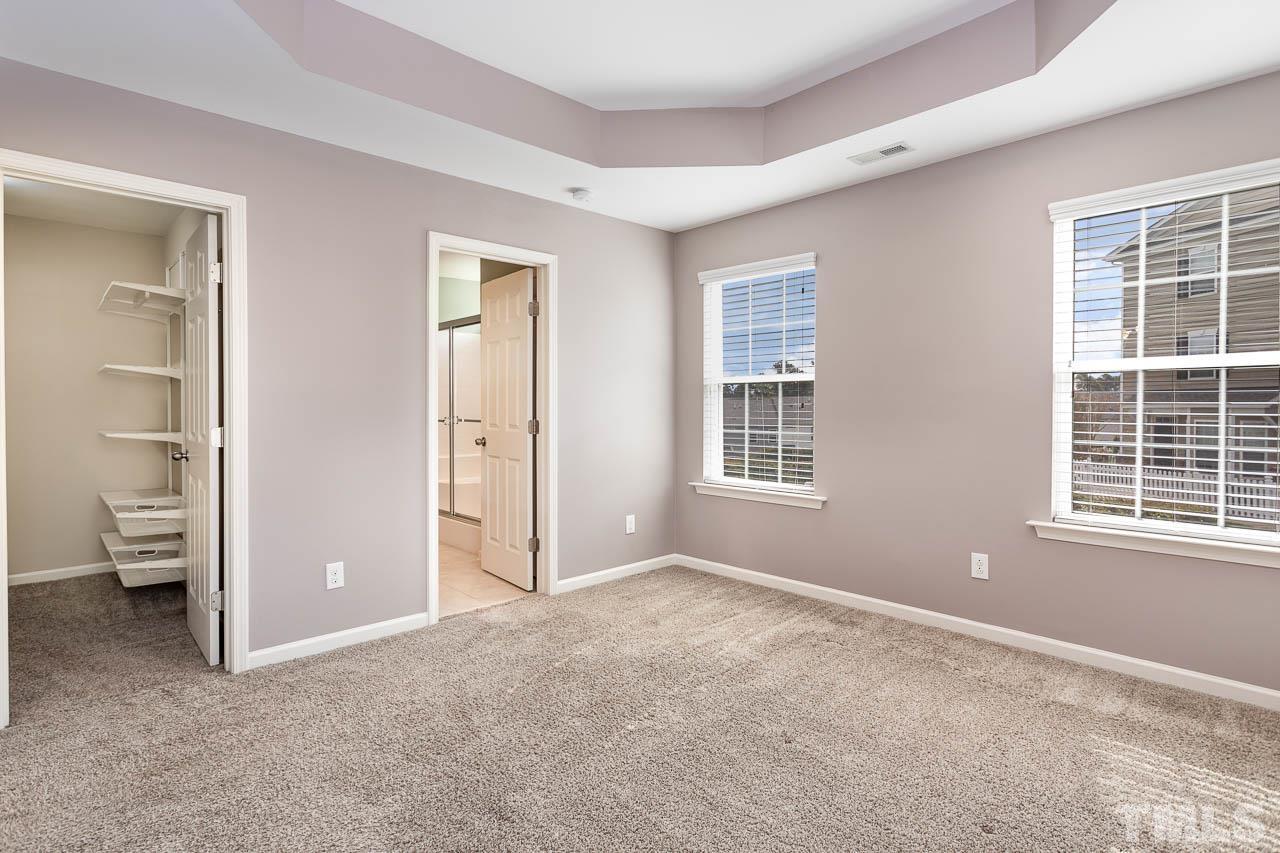 421 Provincial Street Raleigh, NC 27603 - Photo 10 of 22 a view of an empty room with window and bathroom