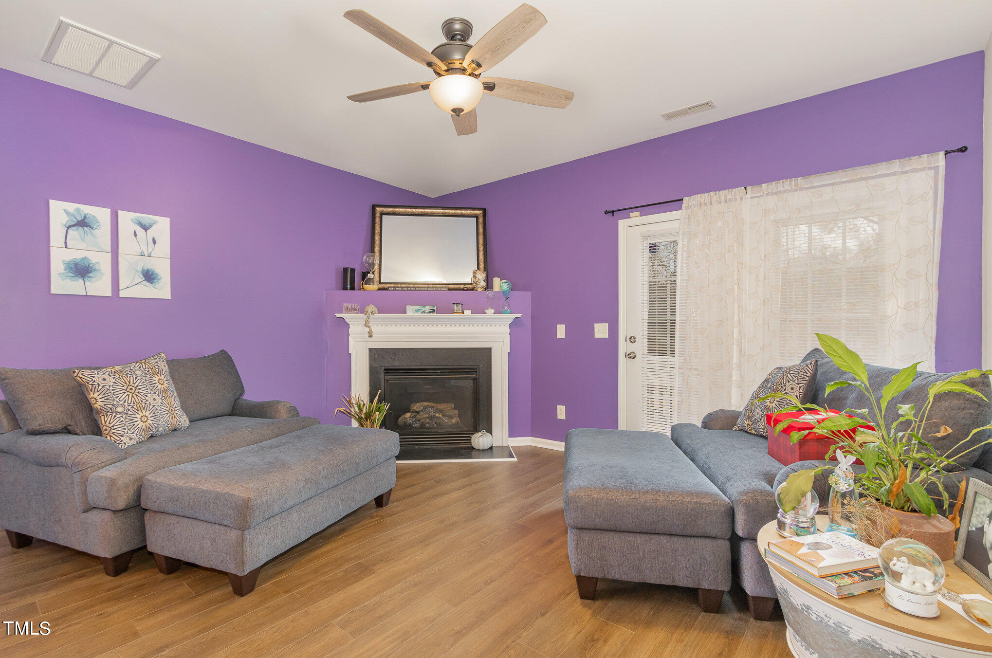 1665 Snow Mass Way Durham, NC 27713 - Photo 17 of 34 a living room with furniture and a fireplace
