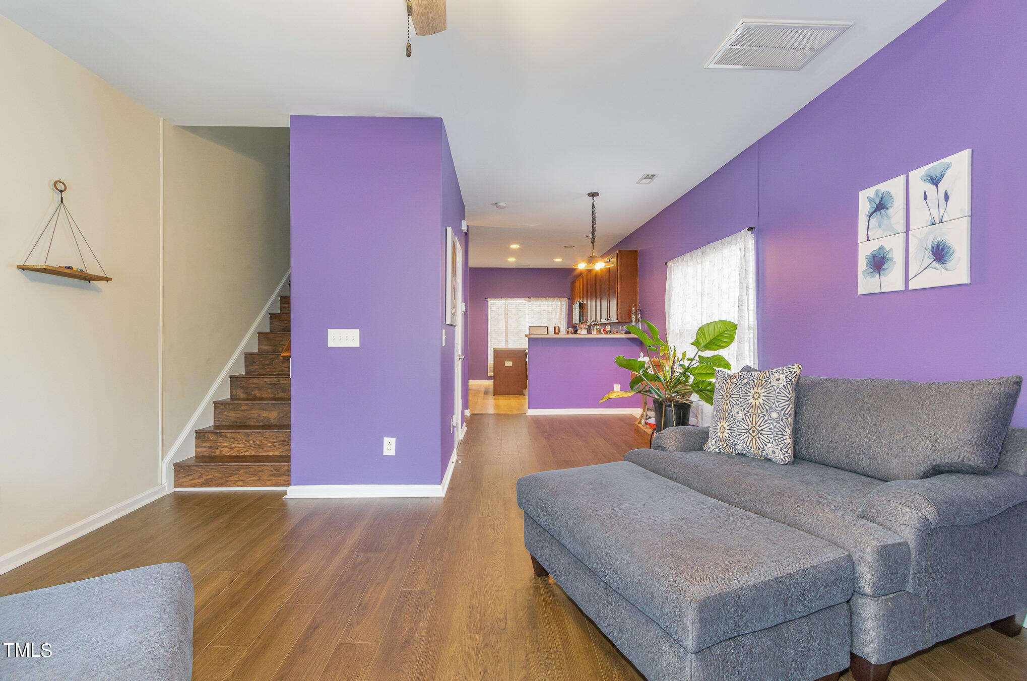 1665 Snow Mass Way Durham, NC 27713 - Photo 18 of 34 a living room with furniture and stairs