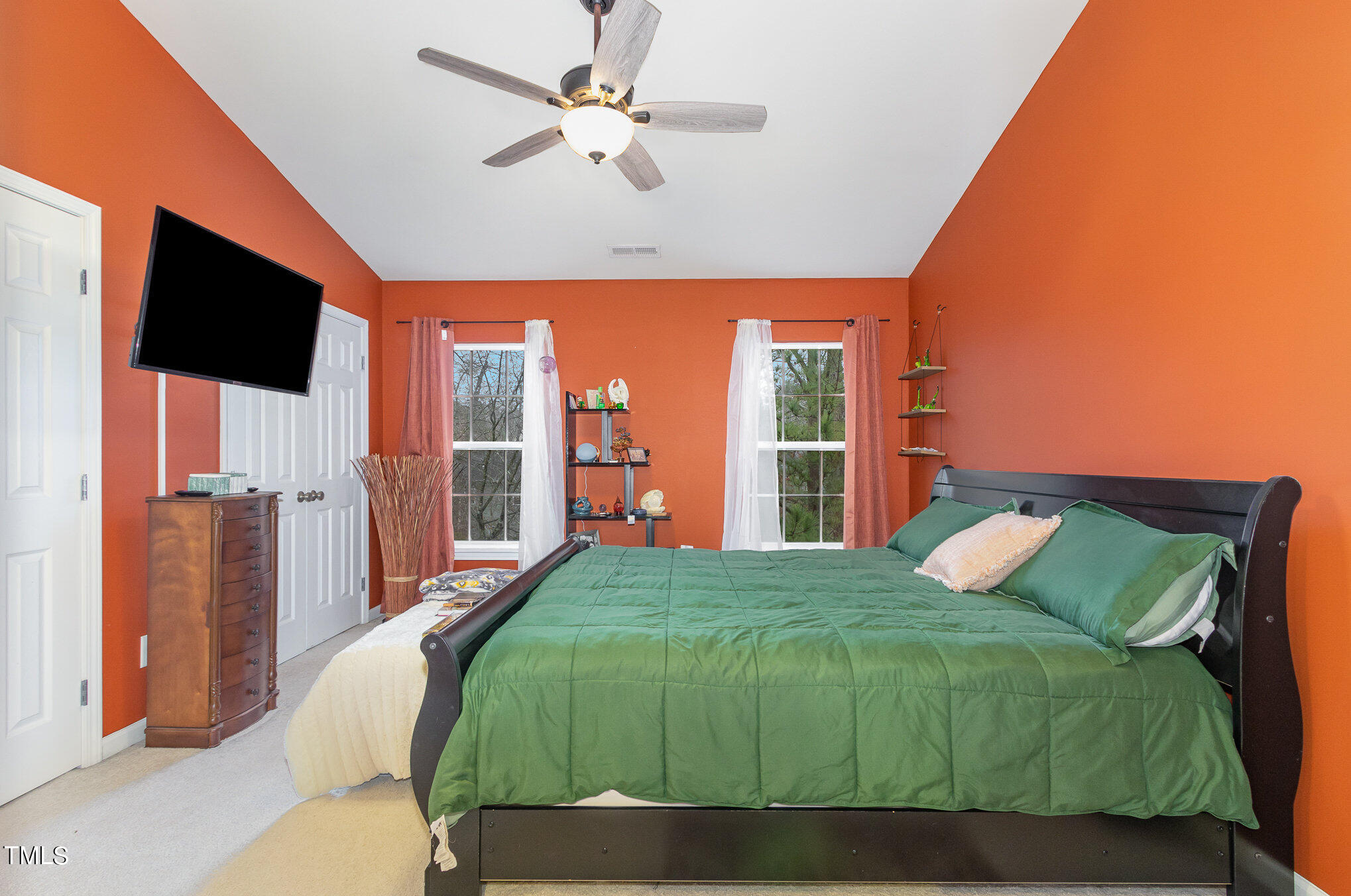 1665 Snow Mass Way Durham, NC 27713 - Photo 20 of 34 a bedroom with a large bed and a large window