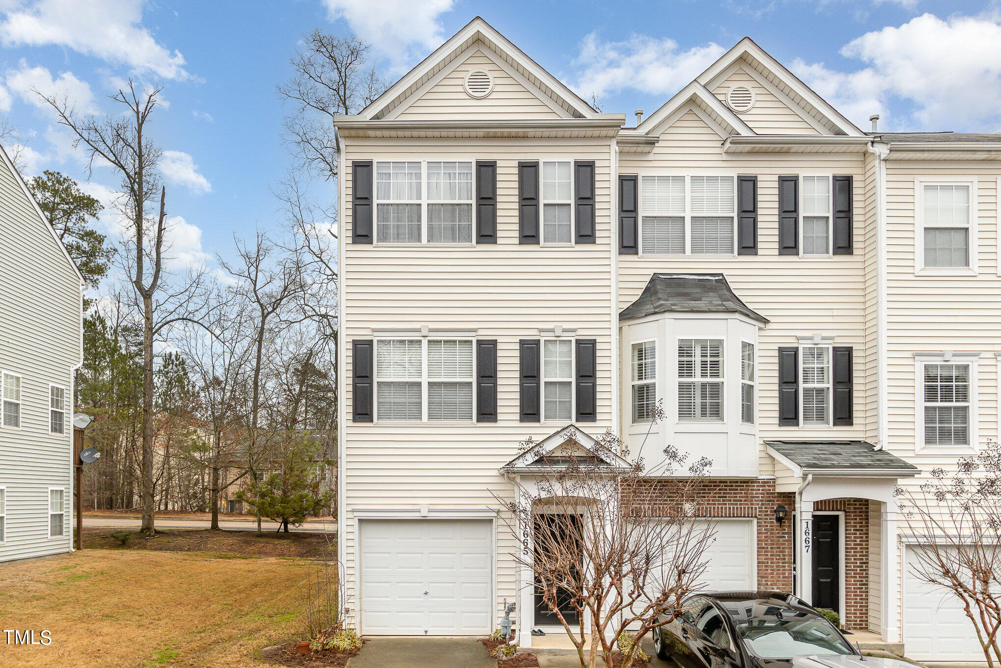 1665 Snow Mass Way Durham, NC 27713 - Photo 2 of 34 a front view of a house with a yard