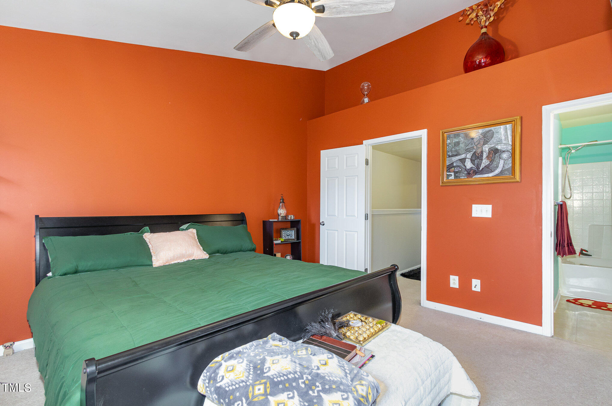 1665 Snow Mass Way Durham, NC 27713 - Photo 21 of 34 a bed room with a bed and a chandelier