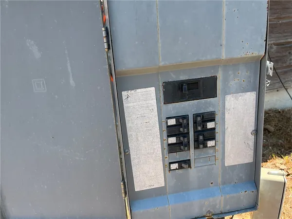 a view of a living room with furniture and storage